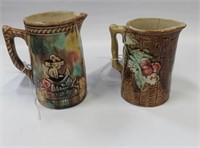 Two majolica stoneware pitchers