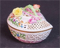 A reticulated 4 1/2" heart-shaped porcelain