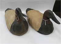 Two canvasback duck decoys marked "DBH"