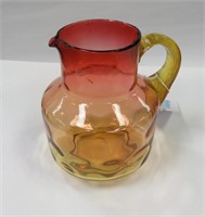 Hand blown Amberina orange glass pitcher