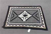 Vintage woven Navajo rug  45" x 62"