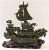 CARVED SOFTSTONE BOAT WITH WOODEN BASE