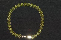 14kt yellow gold Peridot Bracelet 31 stones 12.2 g