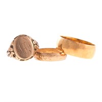 Two Wedding Bands and a Signet Ring in Gold