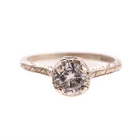 A Lady's 18K White Gold Diamond Filigree Ring