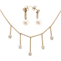 A Lady's Diamond Necklace and Earrings