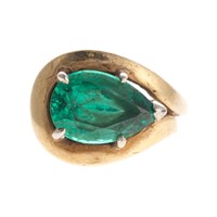 A Lady's 14K Synthetic Emerald Ring