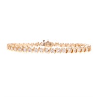 A Lady's Diamond Line Bracelet in 14K Gold