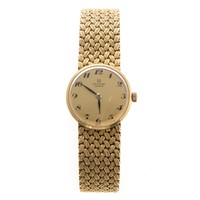 A Lady's Universal Swiss Watch in 18K Gold