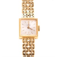 A Lady's Bucherer Wrist Watch in 18K