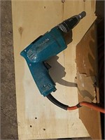 Makita electric drill and cord