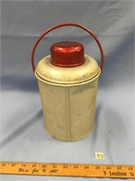 Old thermos with red top           (k 20)