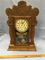 Antique oak American kitchen clock, carved with pe