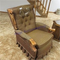 Old rocking chair-faded, torn