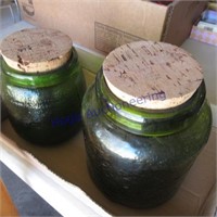 2 green jars w/cork lids