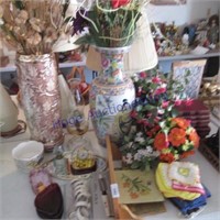 Artificial flowers, books, shelf, vase large crack