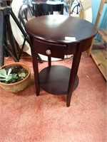 Beautiful circular entryway table with drawer
