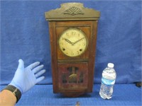 antique wall pendulum clock