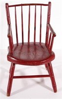 Child's Windsor style arm chair in red paint