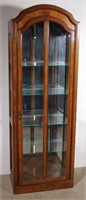oak finished single door curio cabinet with