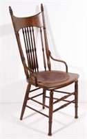spindle back oak side chair with embossed leather