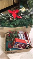 Two boxes of Christmas Decor including garland,