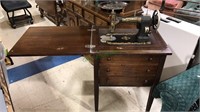 White rotary sewing machine in the cabinet, 30 X