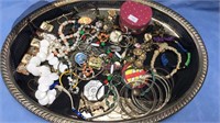 Costume jewelry lot including bangles, necklaces,