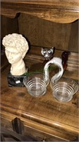 Head sculpture, glass cat, two glass bowls with