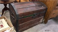Antique dome top trunk with the interior tray