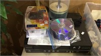 IOn VCR player, stack of new CDs , belkin usb hub