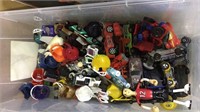Small tub of toy cars and football helmets, (470)