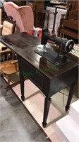 Eldredge rotary sewing machine with the cabinet,