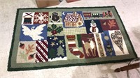 Holiday time rug in the style of the old hook rugs