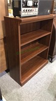 Three shelf bookcase, two shelves are adjustable,