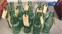 13 - 6.5oz Green w/White Logo Coca-Cola Bottles