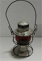 Railroad lantern with red glass