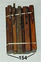 Five assorted wooden molding planes