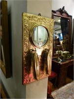 Wall mounted brass mirror w/ two brushes