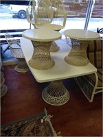 Spun wicker patio table with 4 chairs 3 ottomans