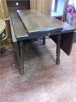 Solid wood drop leaf table with one leaf vintage