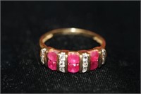 Ladies 14kt yellow gold (6) Rubies, (10) CZ's Ring