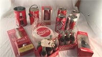 Assorted Coca-Cola cans and bottles