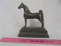 Small metal horse statue