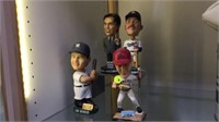 4 BOBBLEHEAD FIGURES