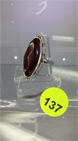 STERLING SILVER RING WITH RUST COLORED GEM