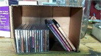 BOX WITH 4 MUSIC DVDs & 8 UNOPENED CDs