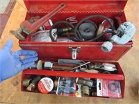 plumbing tools & supplies in red tool box