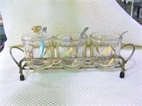 Condiment set in holder with spoons