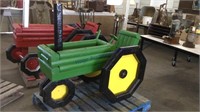 Green wooden planter narrow front tractor